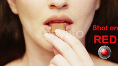 Woman Eating Chocolate.