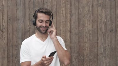 Dude Listening To Music Through Headphones.