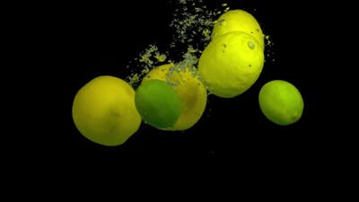 Citrus Fruit in Splash Water on a Black Background.