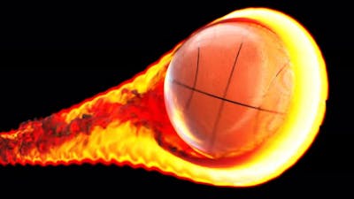 Flying basketball on fire on a black background.