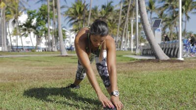 Woman Strtching on Lawn.