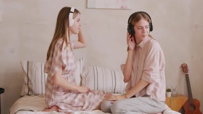 Happy Twin Girls Dancing to Music.