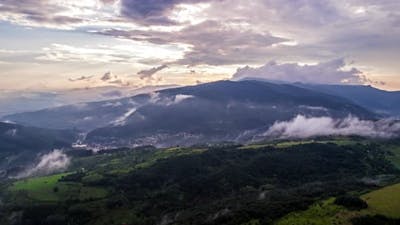 Epic Foggy Sunset And Mountains After Rain.