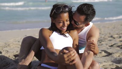 Happy Couple Embracing on Shore.