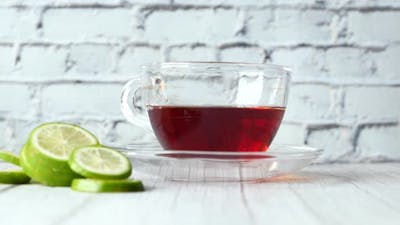 Close Up of Lemon Tea on Wooden Background..