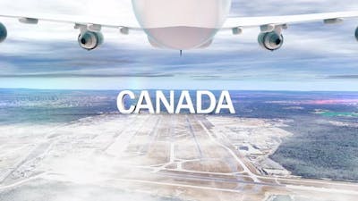 Commercial Airplane Over Clouds Arriving Country Canada.
