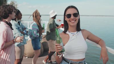 Girl with Beer on Pier Party.