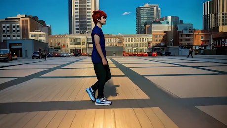 A young man with red hair walks in the city center on a sunny day.