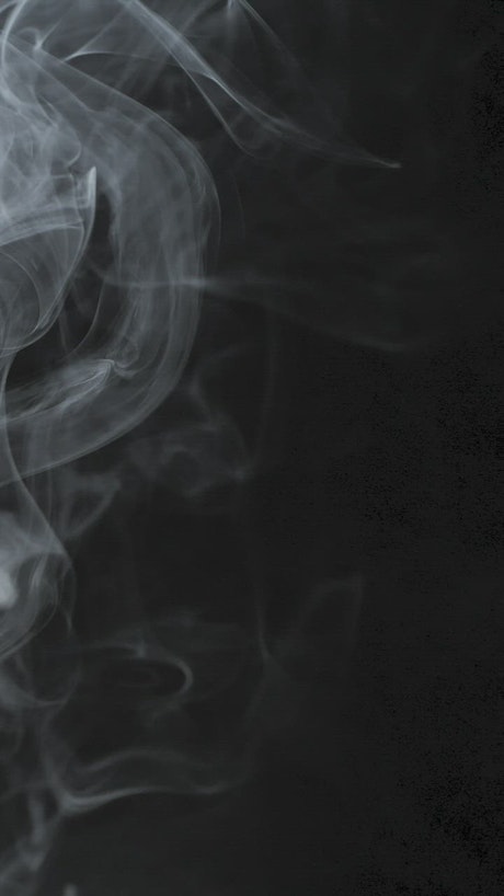 Black background with smoke foreground.