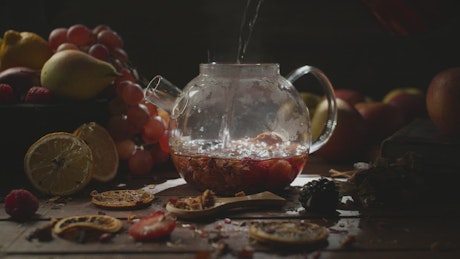 Brewing hot fruit tea.