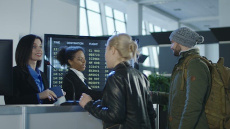 Checking in at the airport counter.