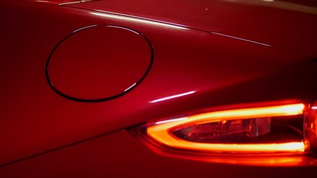 Close up of red sports car.
