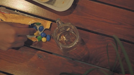 Coffee table with food scraps.