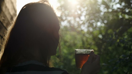 Drinking tea on a cool morning.