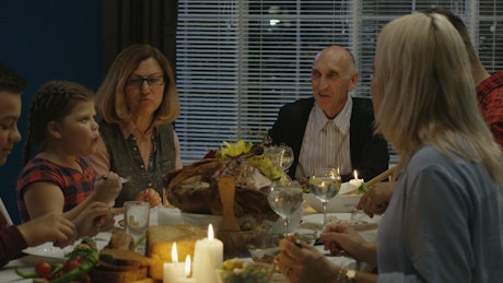 Family having dinner at home.