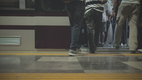 People getting into the subway train.