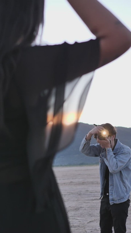 Photoshoot of a girl posing in the desert.