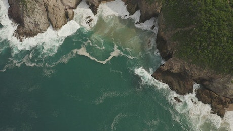 Sea waves in a little bay.