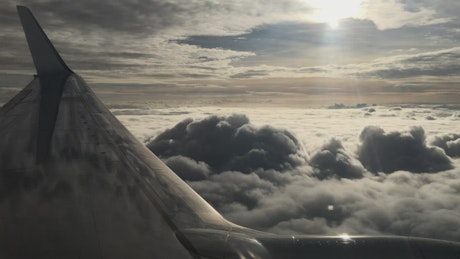 Smooth flying above the clouds.