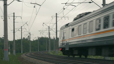 Train heading along a rural route.