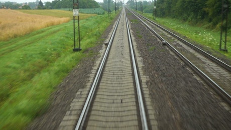 View of  the rail tracks from the train.