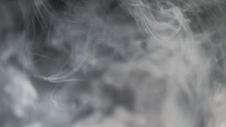 White smoke with black background.