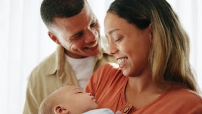 Home, mother and father with baby, love and family with childcare development.