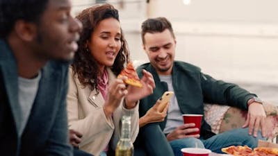 Pizza, party and friends with alcohol outdoor for celebration, social lifestyle.