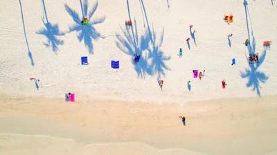 Crowds of people gathered on the beach.