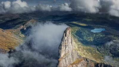 Clouds Dance Above the Peaks.